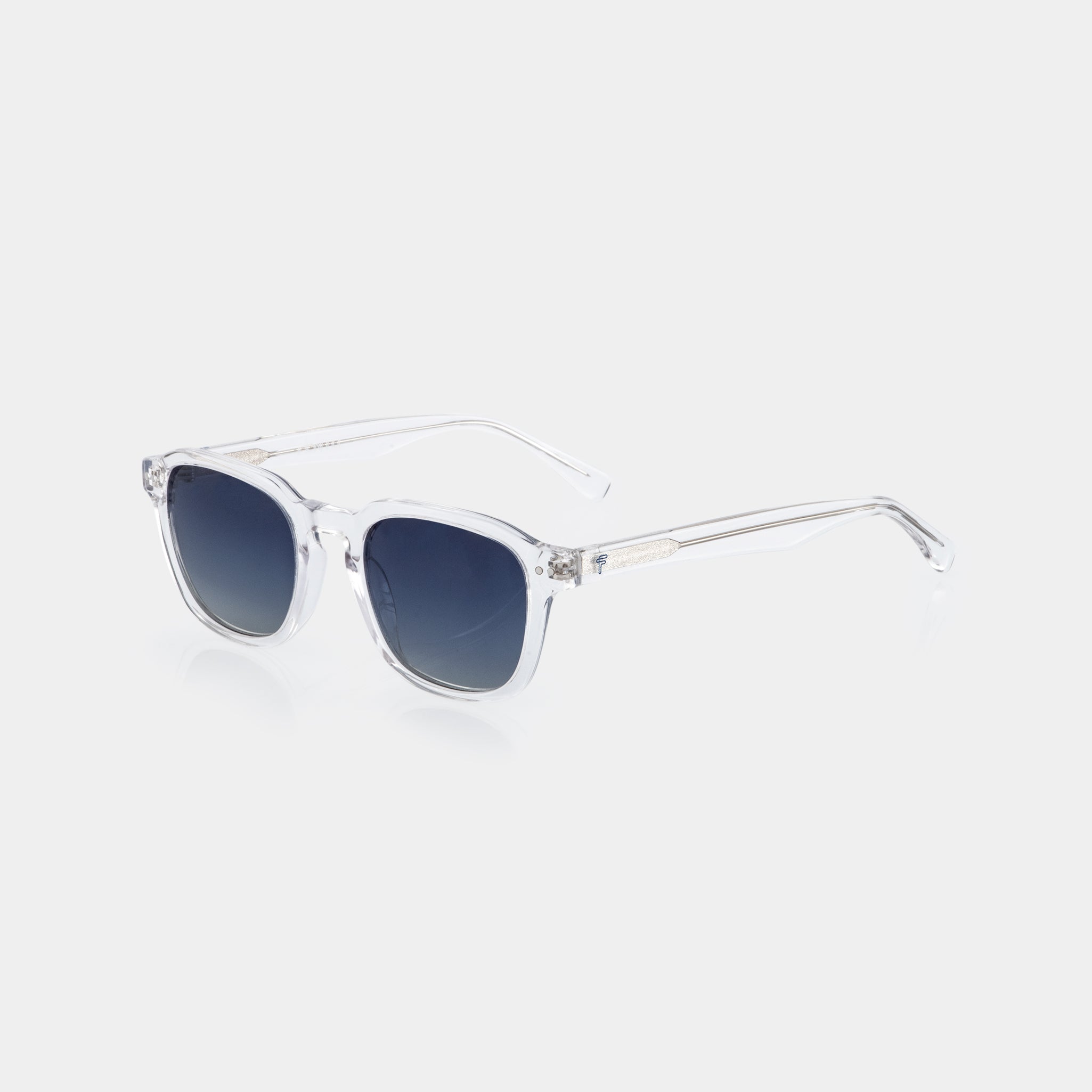 Make waves in every look. Crafted from transparent blue acetate, the Nova sunglasses by Fento bring a vibrant, contemporary twist to timeless eyewear design.